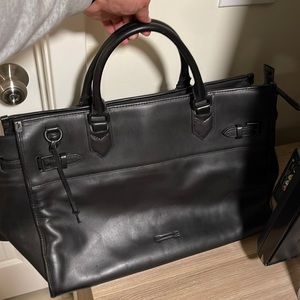 Minkoff black leather weekend bag with shoulder strap